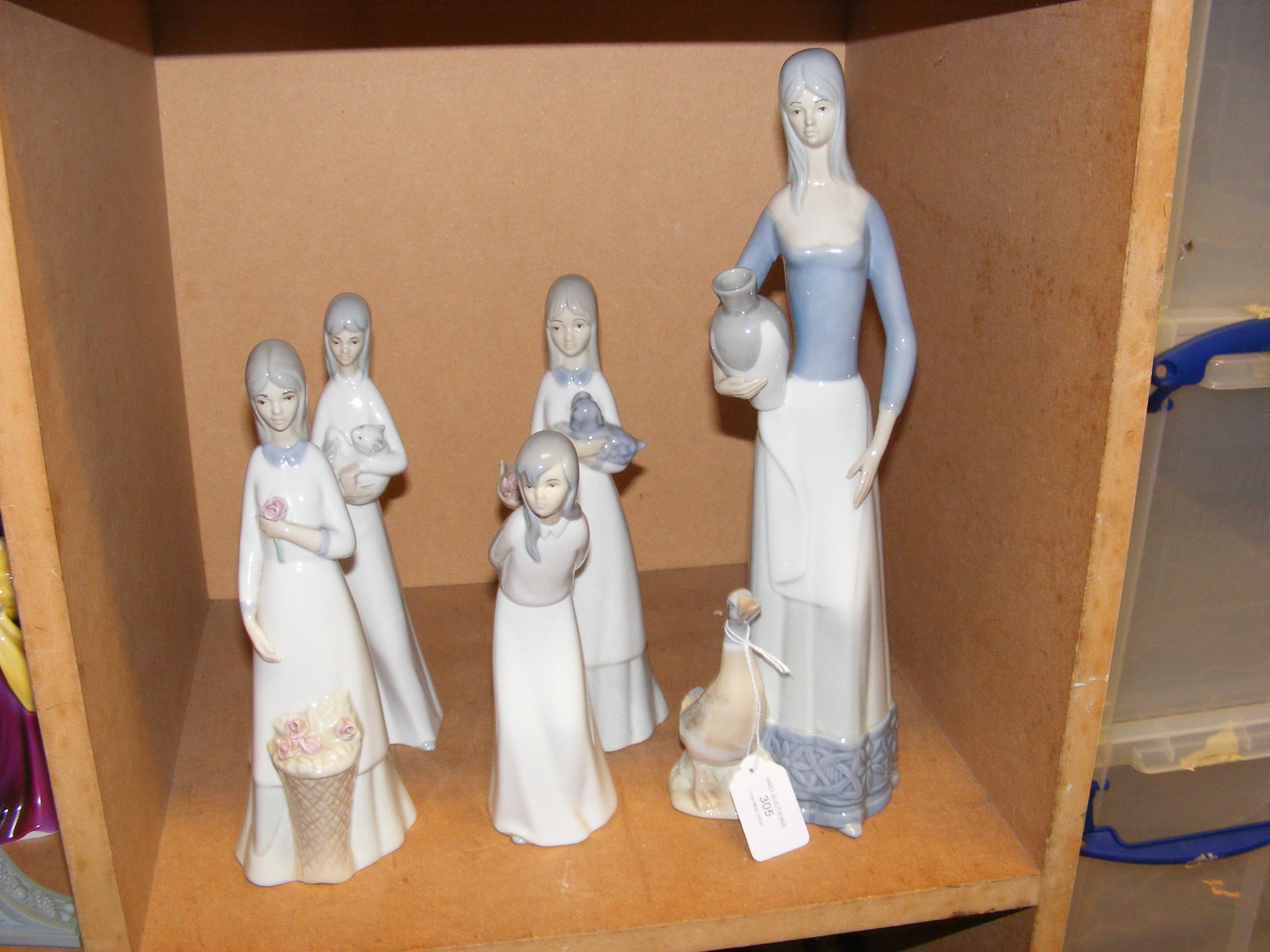 A quantity of Spanish porcelain figures in the sty