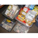 A quantity of loose stamps in boxes and tubs - in