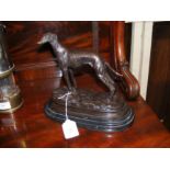 A reproduction bronze figure of Greyhound