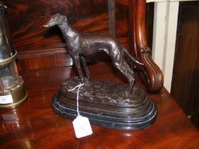 A reproduction bronze figure of Greyhound