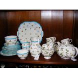 A four place Wedgwood 'Wild Strawberry' teaset, to