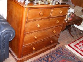 A Victorian mahogany chest of two short and three