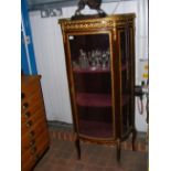 A reproduction French display cabinet