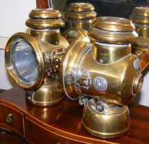 A pair of 23cm high antique G.P.O lamps with maker