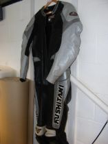 A Kushitani one piece motorcycle leather in grey and black - UK