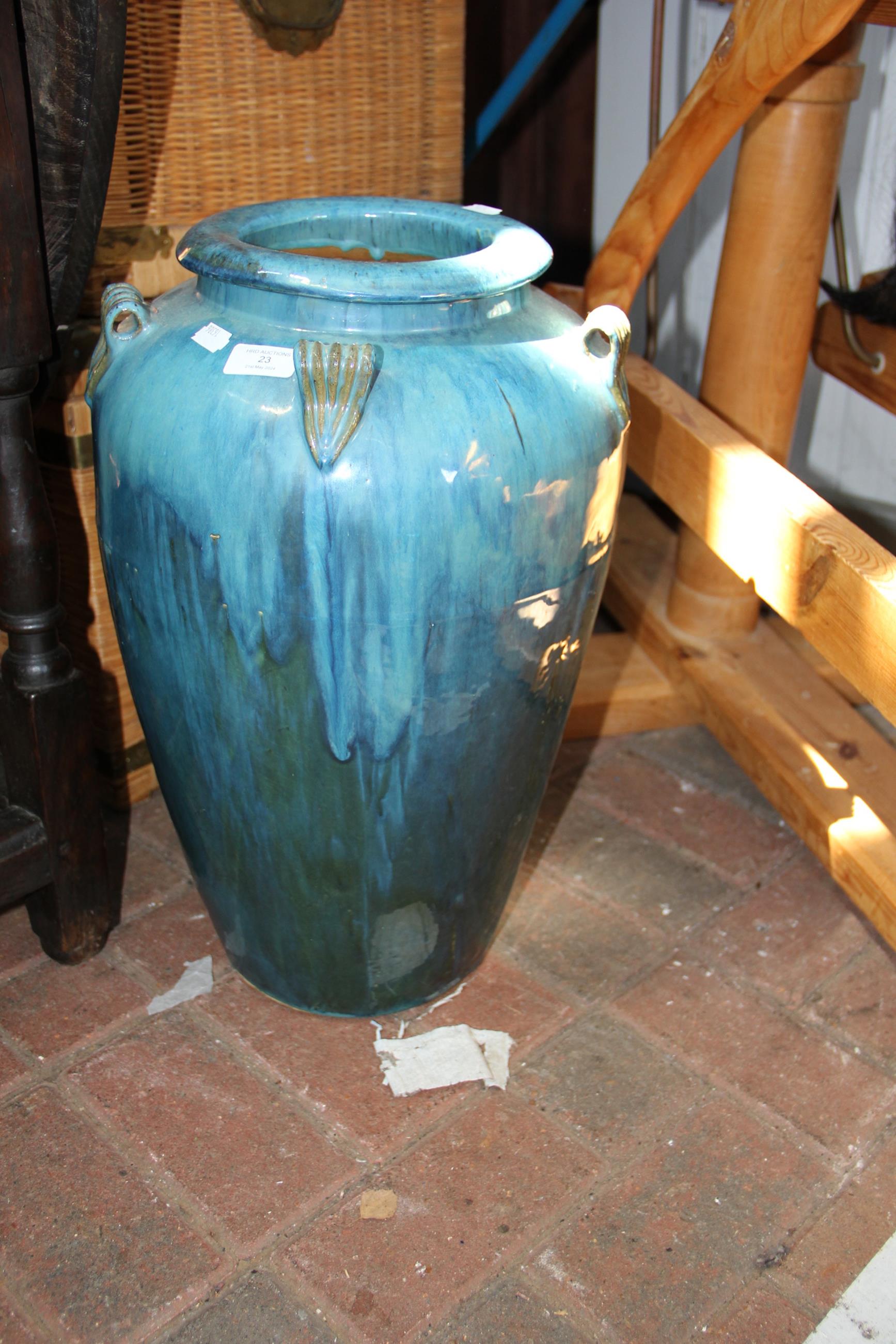 An attractive 52cm high blue glazed floor vase