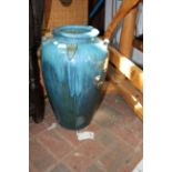 An attractive 52cm high blue glazed floor vase