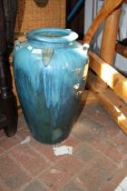 An attractive 52cm high blue glazed floor vase