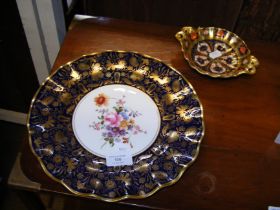 A Derby china plate with hand painted floral centr
