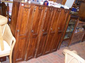 A bank of 5 antique pine golf or sports locker room lockers - width 148cm