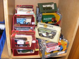 A quantity of boxed die cast model vehicles, inclu