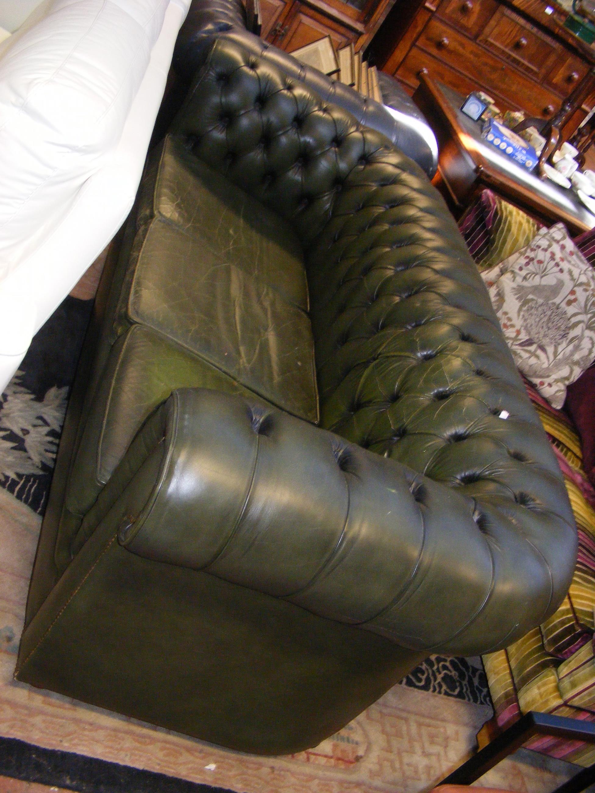 A Victorian style button back three seater Chester