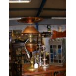 A converted brass and copper lamp, together with a