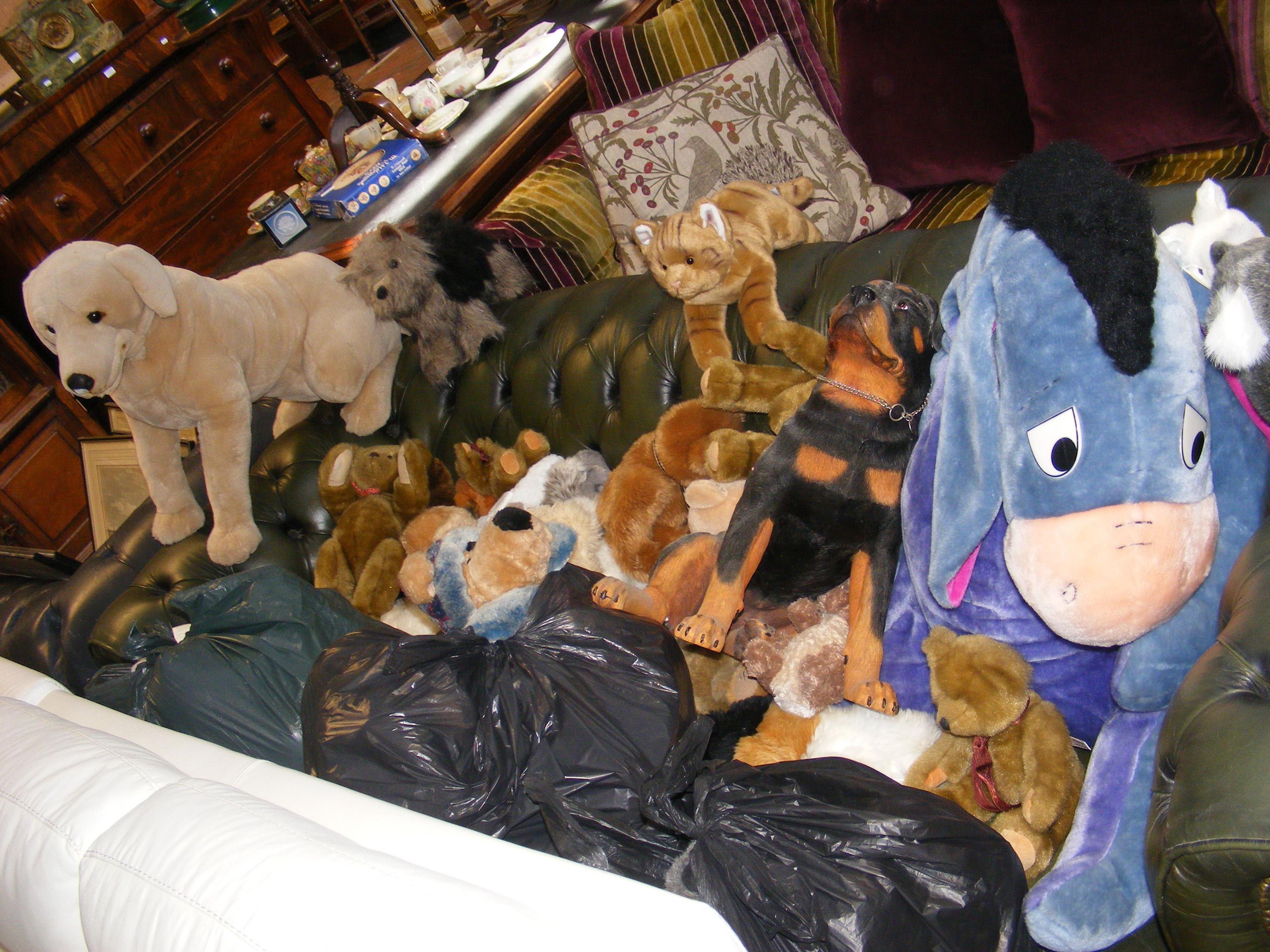 A large quantity of plush soft toys, together with