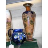 A Moorcroft Pottery jug, together with a Doulton s