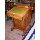 A Victorian burr walnut Davenport desk with four d