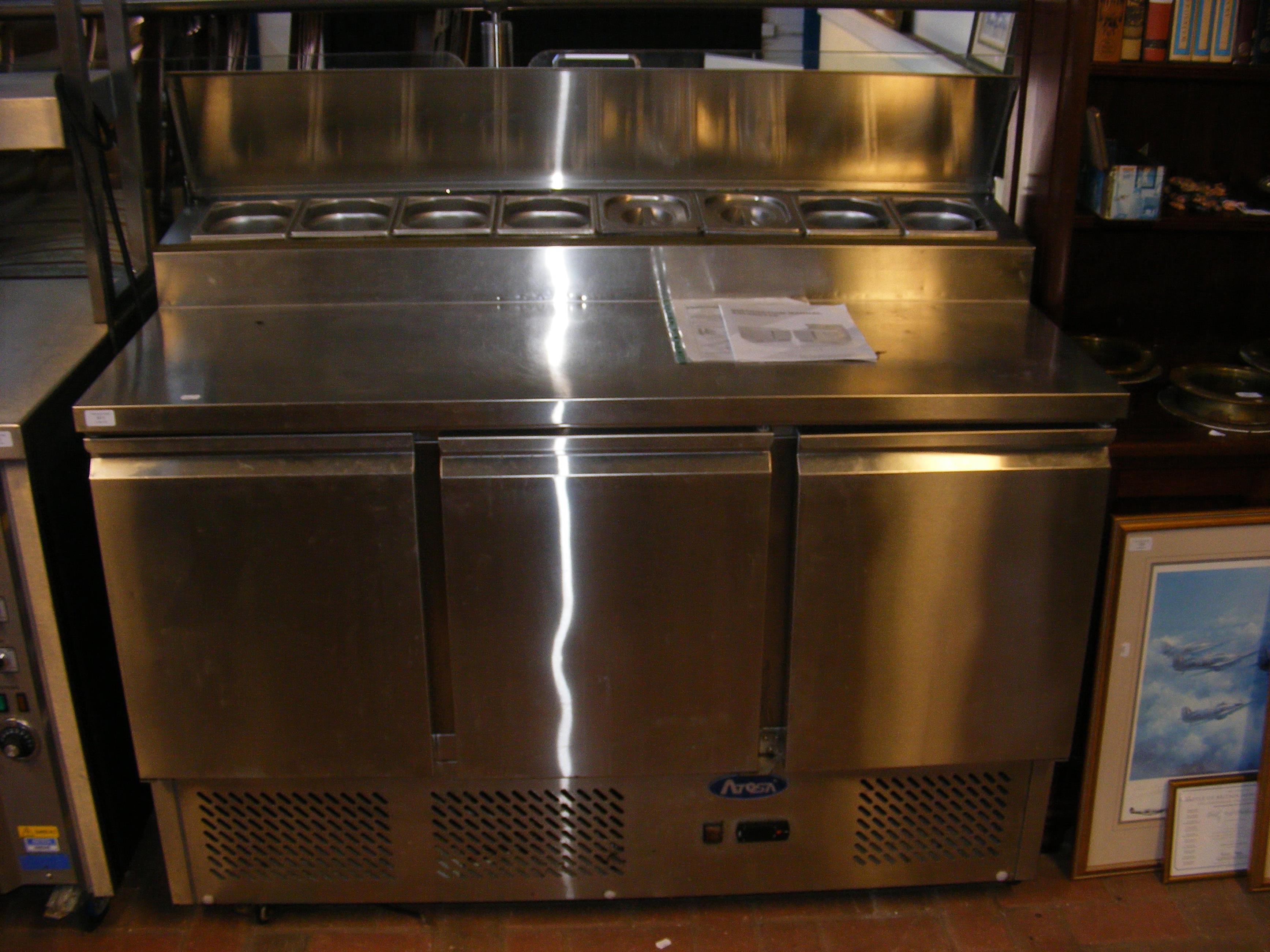 A commercial stainless steel salad bar with temperature control