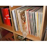 A collection of vinyl LP records, including Donny
