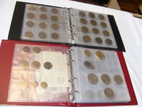 An album of collectable coinage and one other