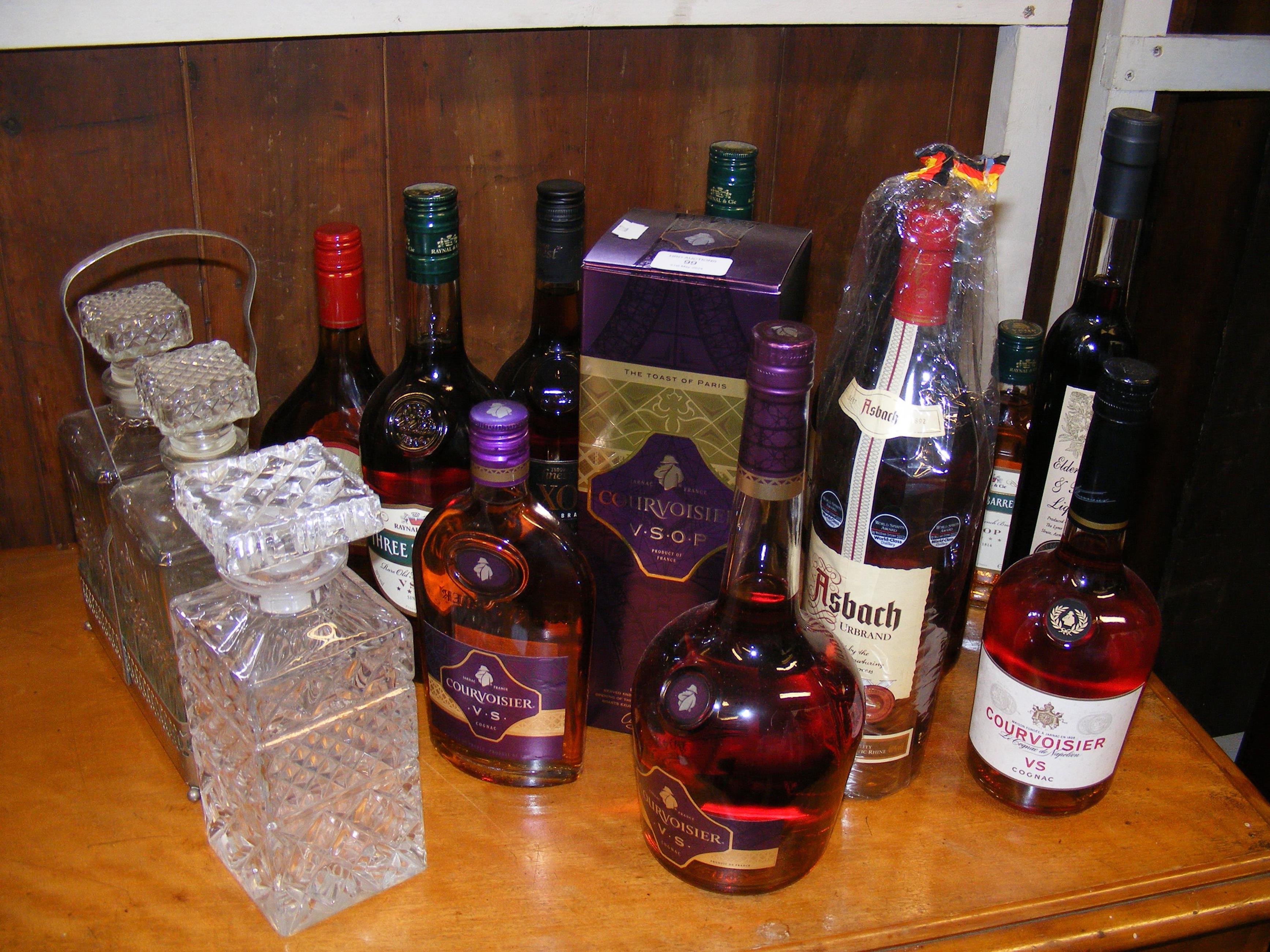 Various unopened bottles of Cognac and other spiri