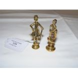 A pair of 5.5cm high brass pipe tampers - Fagin an