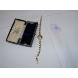 A gold cased ladies wrist watch with original box
