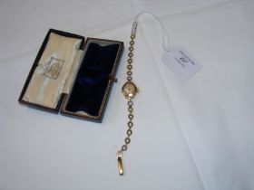 A gold cased ladies wrist watch with original box