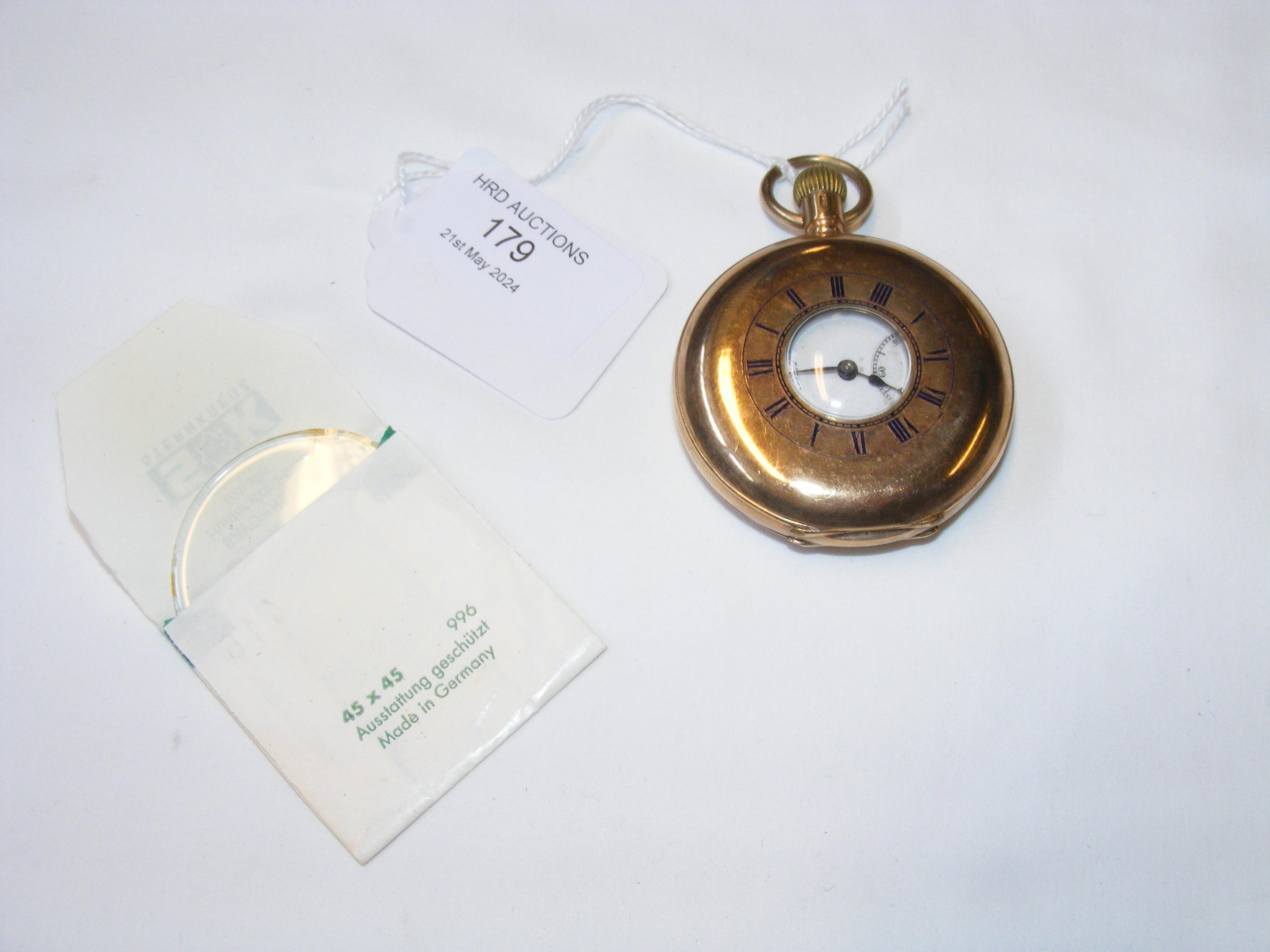 A 9ct half hunter pocket watch by Benson