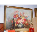 An oil on canvas of still life flowers - signed ST