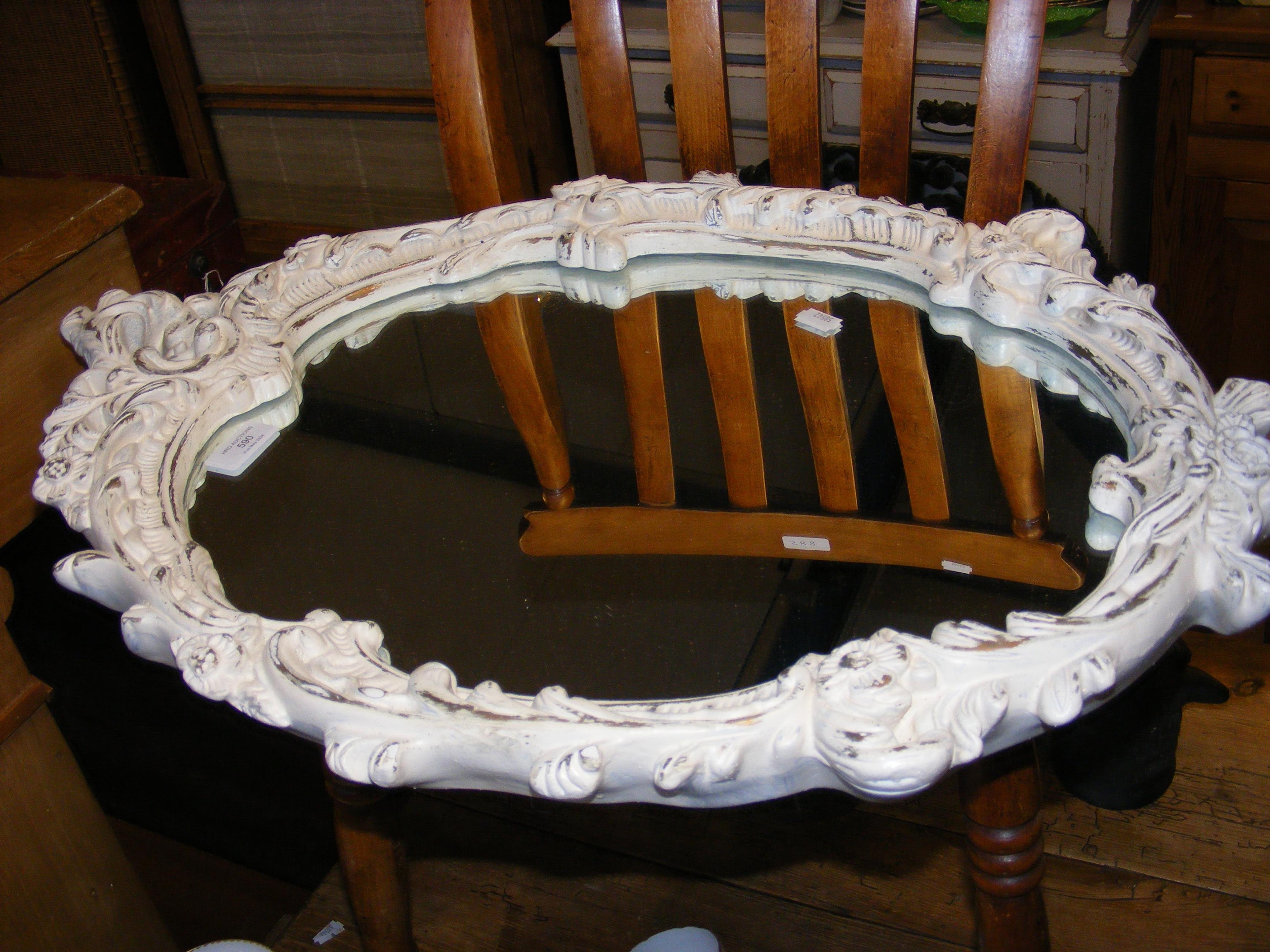 A French style oval mirror