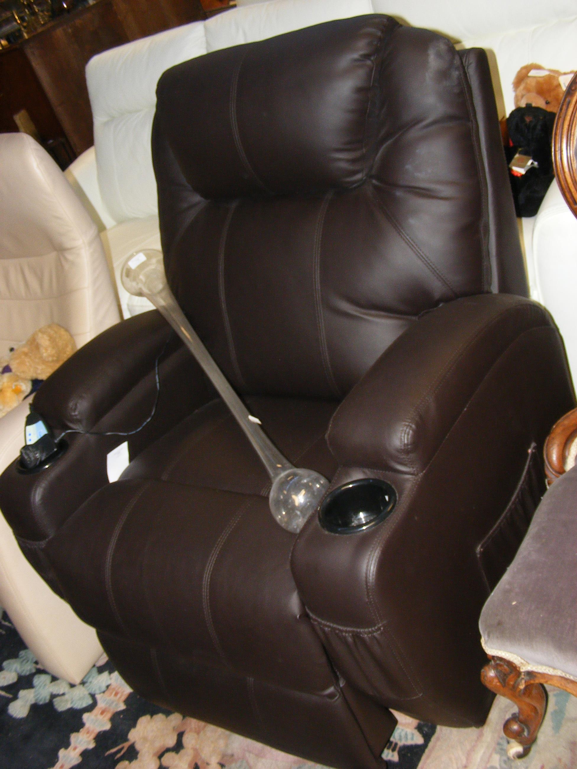 A Homcom massage chair in brown leather