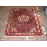 A small Middle Eastern rug with geometric border -
