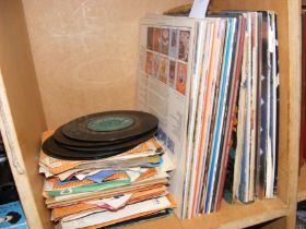 A collection of vinyl LP and single records