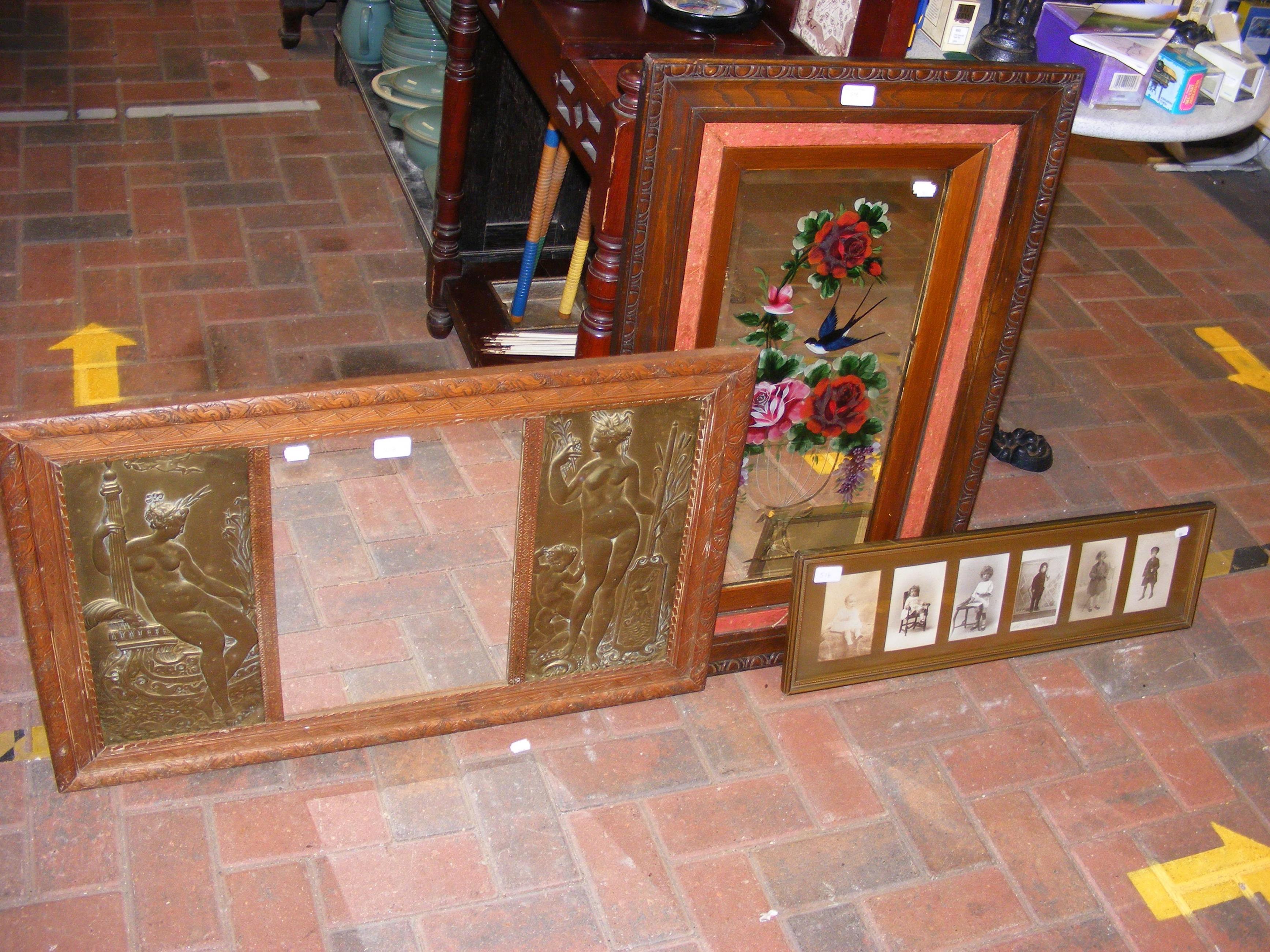 An antique painted 'gypsy' wall mirror, an Art Nouveau wall mirror bearing repousse panels, and a fr