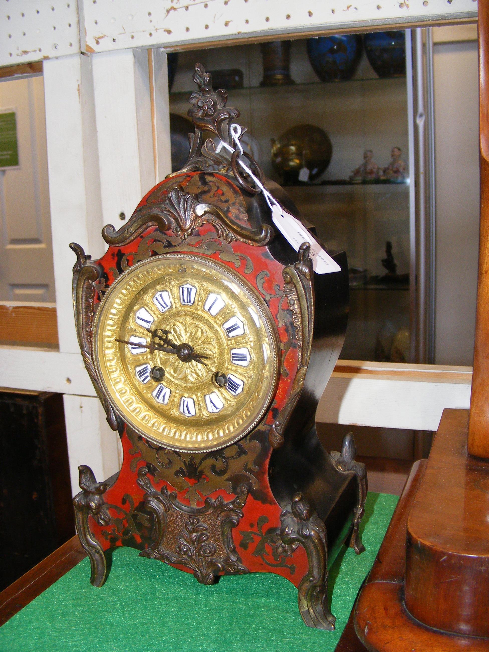 A 30cm high antique French Boulle mantle clock