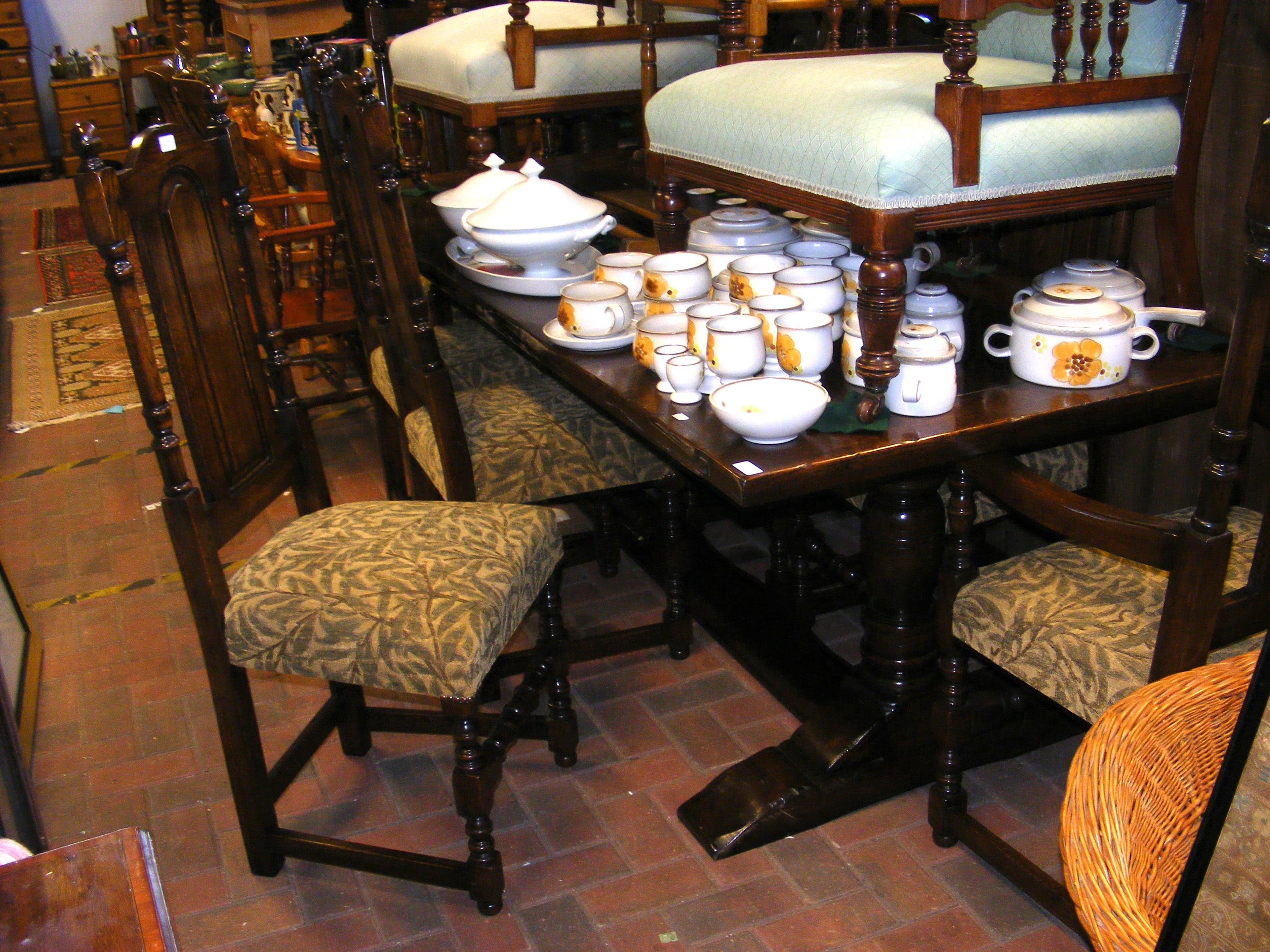 A 229cm long reproduction refectory table with eig