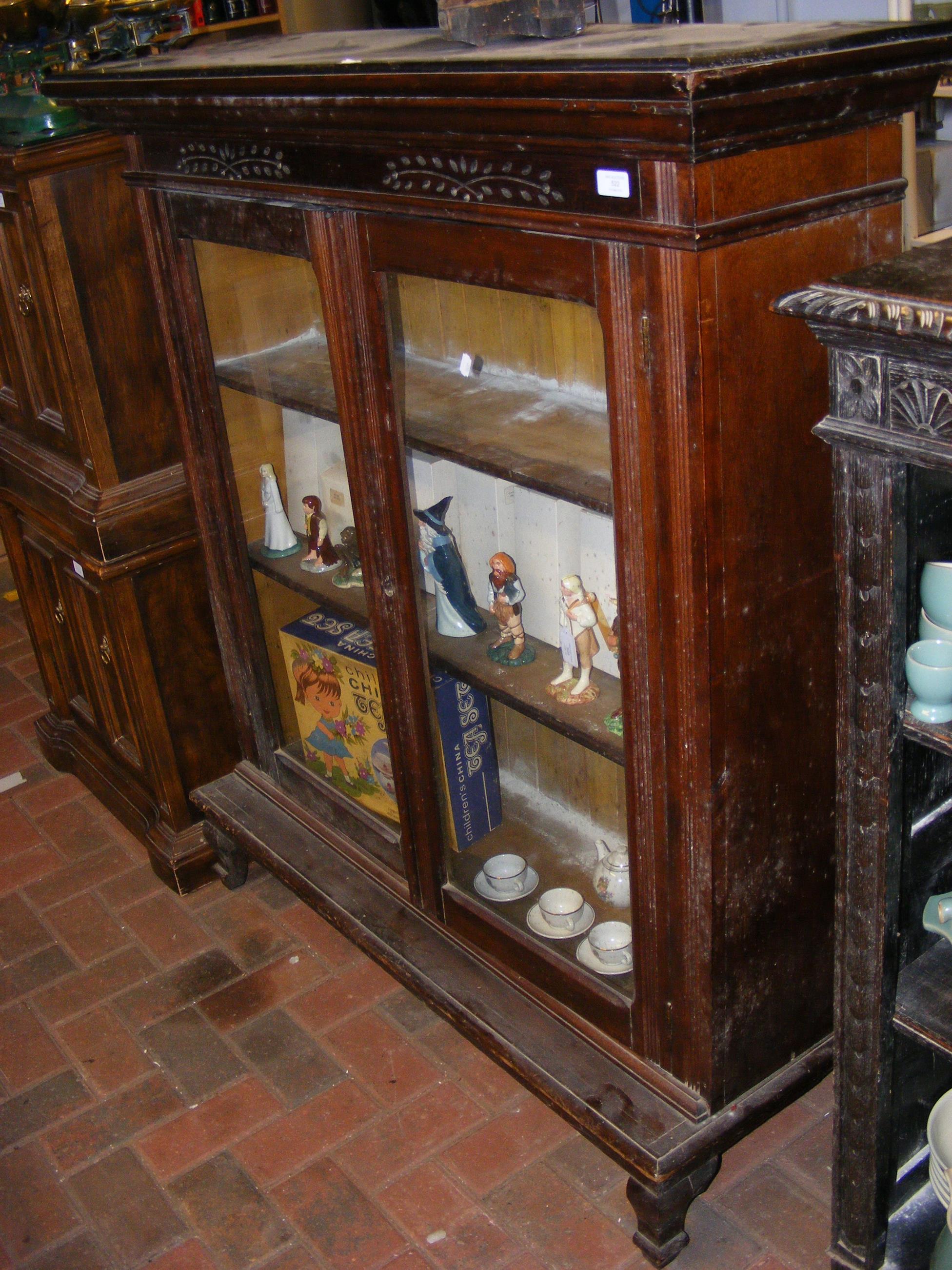 A mahogany glazed bookcase - width 122cm