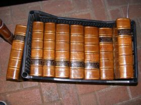 A selection of early leatherbound books including