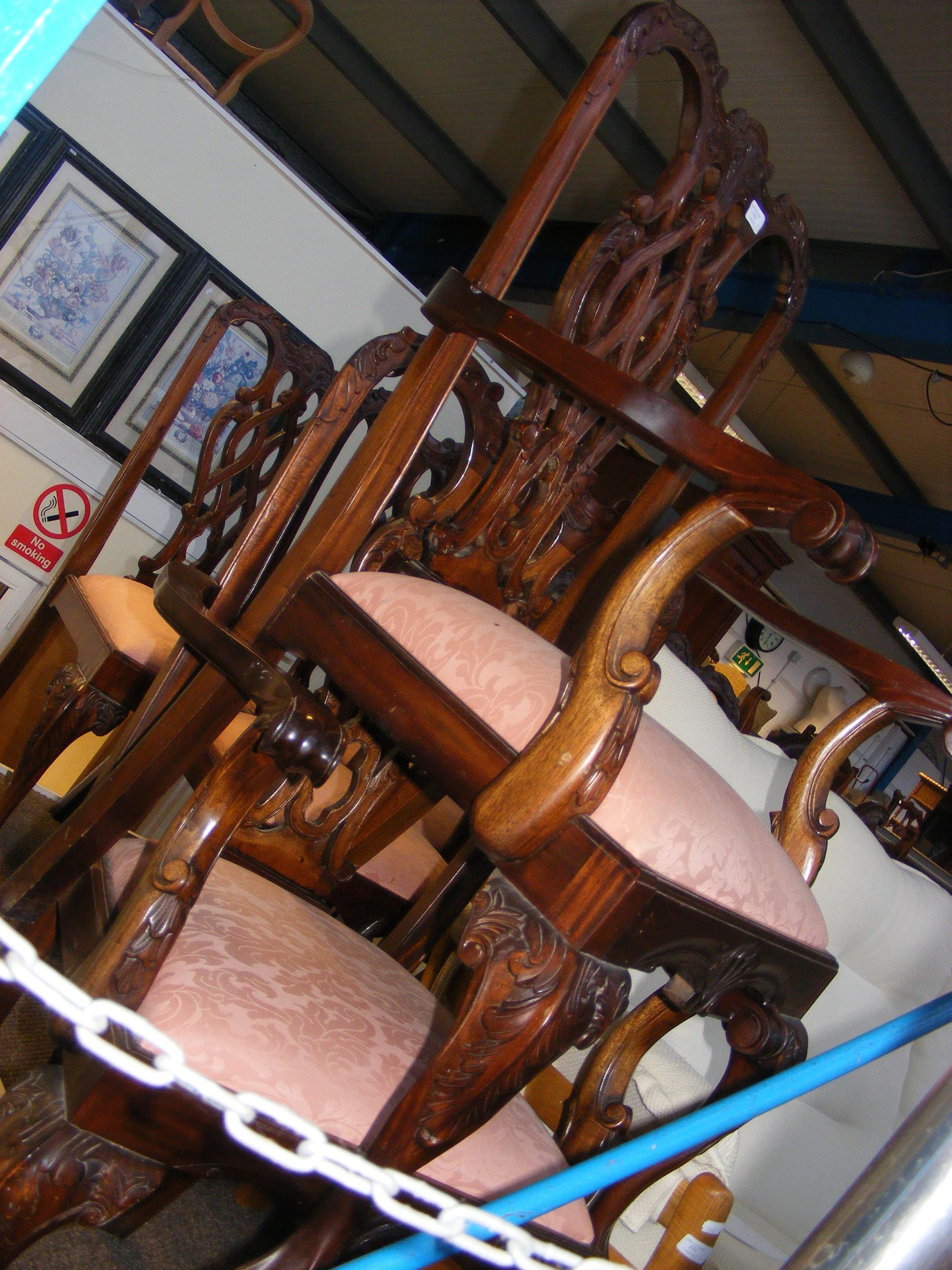 A set of six (4+2) dining chairs with decorative b