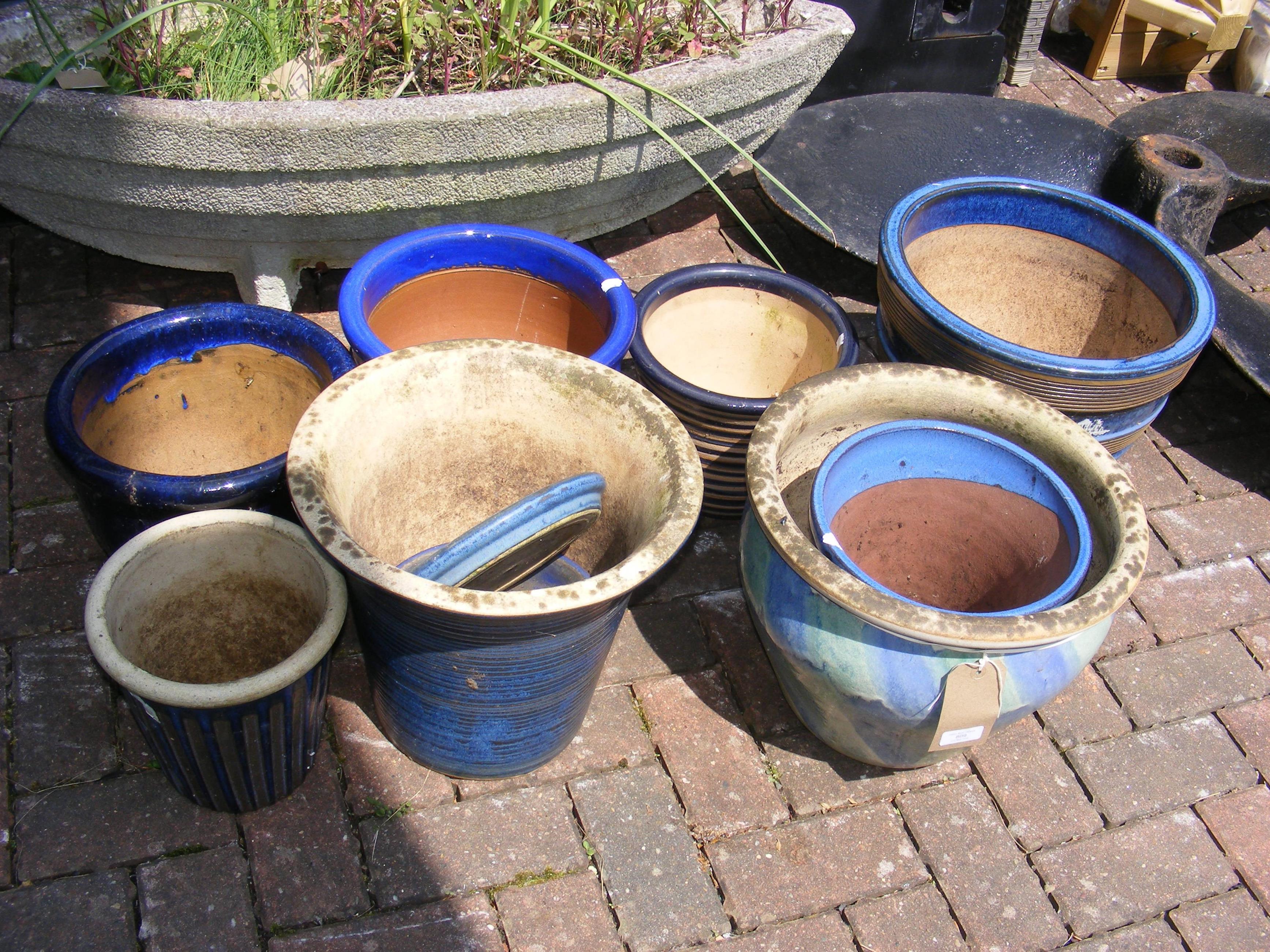 Assorted blue glazed pots