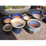 Assorted blue glazed pots