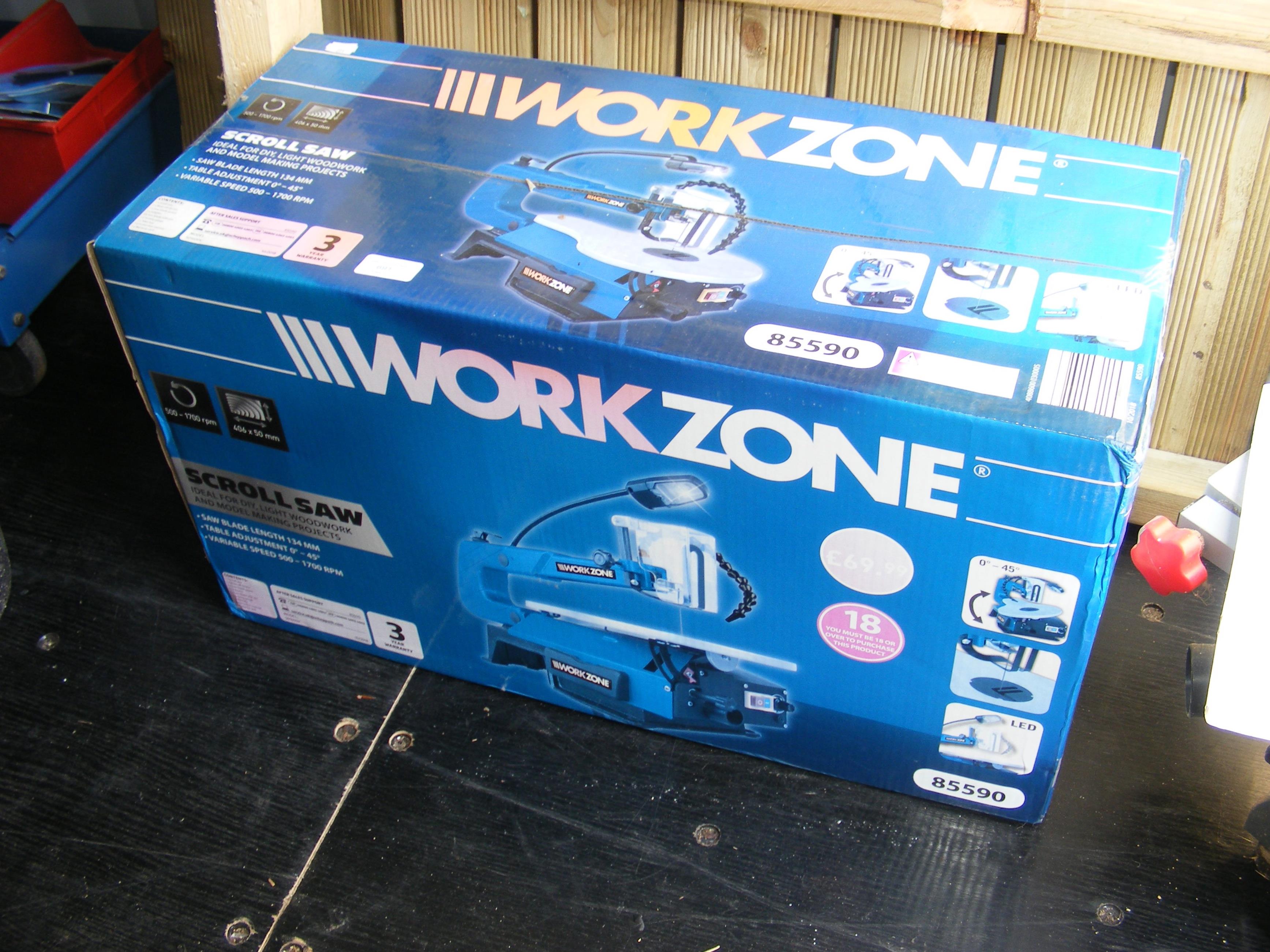 An un-opened Workzone scroll saw