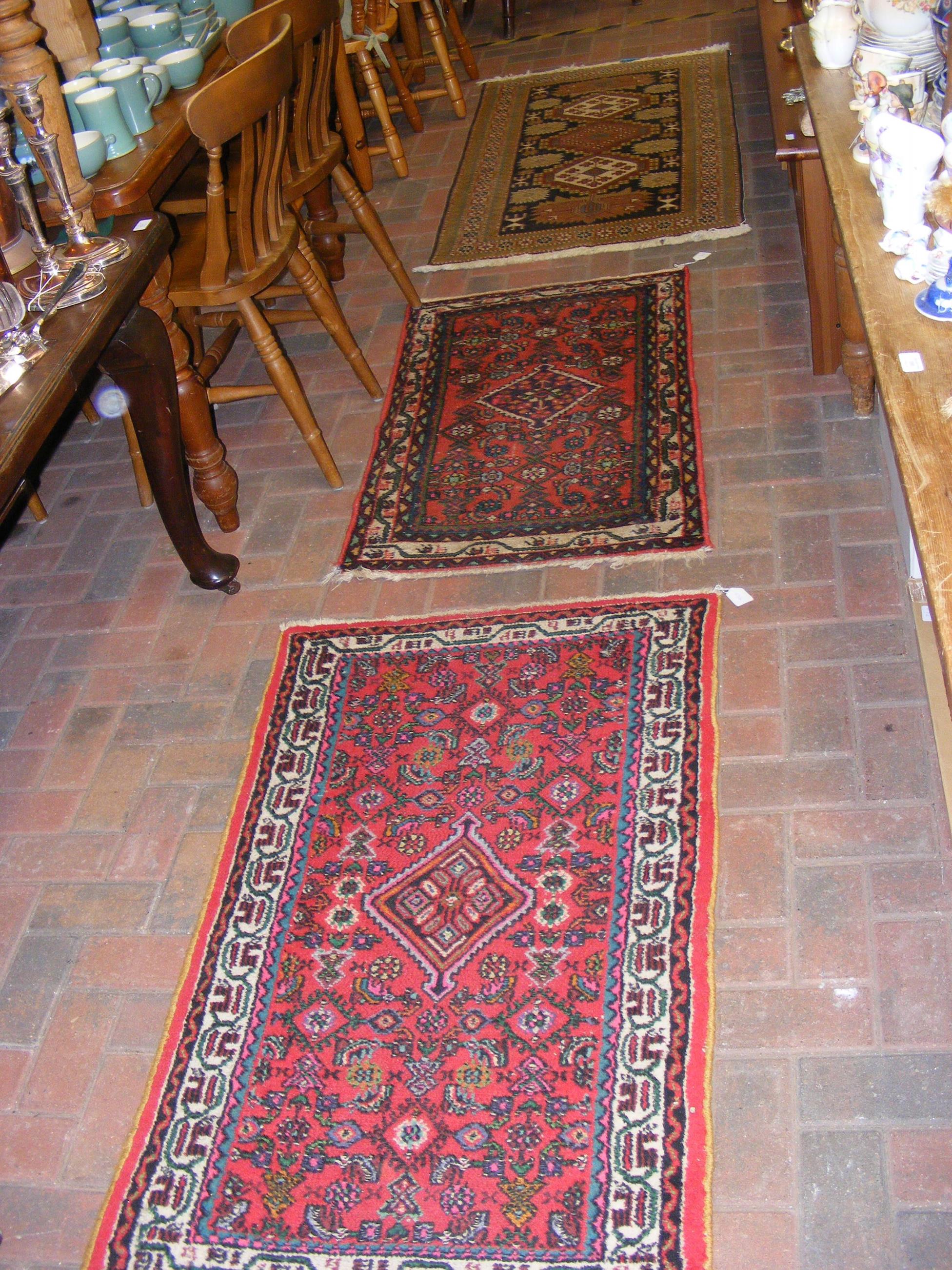 Three Iranian rugs