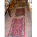 Three Iranian rugs