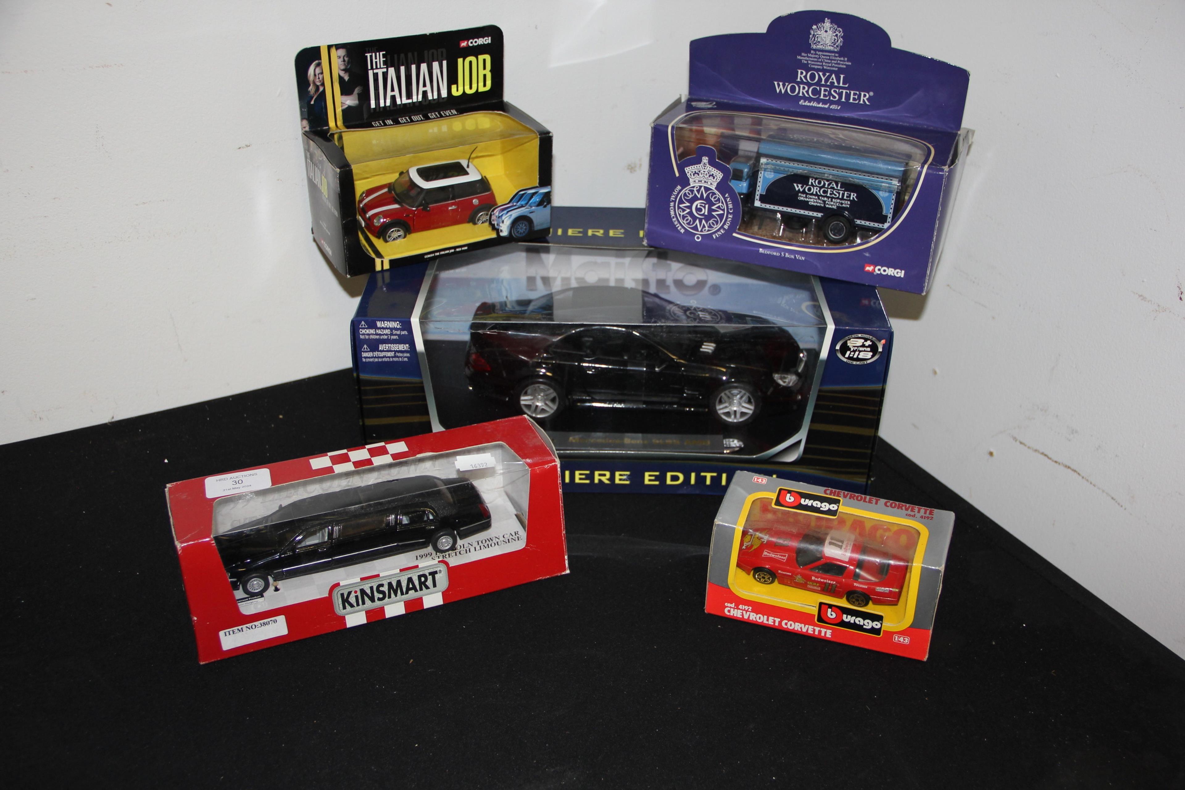 Boxed die cast Mercedes Benz, together with four o