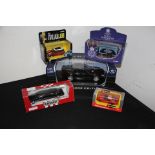 Boxed die cast Mercedes Benz, together with four o