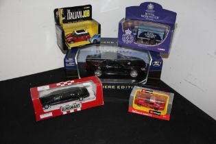 Boxed die cast Mercedes Benz, together with four o