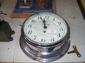 A Tempora chrome ships baulk head clock with separ