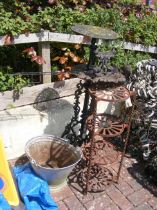 A galvanised metal bucket, together with boot scra