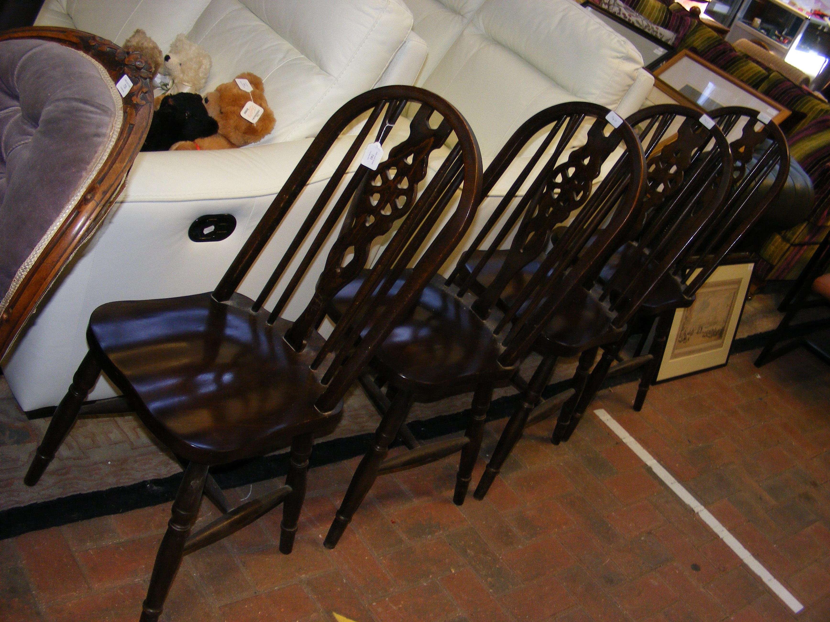 A set of four Windsor back chairs
